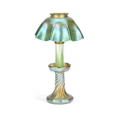 Louis Comfort Tiffany, Louis Comfort Tiffany, A Favrile Glass Table Lamp, Circa 1910, glass with a green feather pattern, the base with petrol lustre