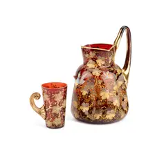 Mary Moser, A Moser Gilt And Enamelled Amberline Glass Pitcher And Beaker, Early 20Th Century, glass, decorated with trailing grape-boughs and bas-relief bird to the body, inscribe