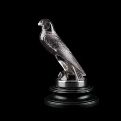 René Lalique, René Lalique (French, 1860-1945), 'Faucon', A Car Mascot, Designed 1925, glass with an amethyst tint, moulded R