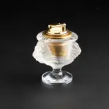 A Lalique Table Lighter by Lalique, glass, sold Jul 2024