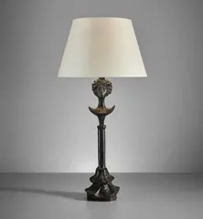 Alberto Giacometti, "Tête de femme" table lamp, designed circa 1933, later cast, Patinated bronze, paper shade