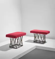 Jean Royere, Pair of "Mirabeau" stools, circa 1957, Painted steel, brass, fabric upholstery