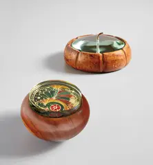 Two lidded boxes by Fontana Arte, circa 1939, circa 1960, Glass, walnut, enamel, brass, sold Dec 2019