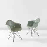 Charles Eames and Ray Eames, Pair of "DAR" armchairs
