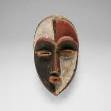 Mask by Aduma, carved and painted wood, sold Aug 2026
