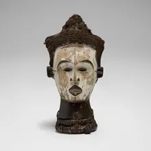 Igbo, Dance crest, carved and blackened wood, kaolin, human hair, fiber, cloth