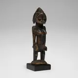 Senufo, Female Pombia figure, carved wood