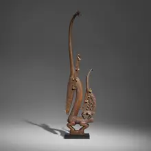 Bamana, Large Chi Wara (antelope headdress), carved wood, shells, leather