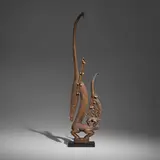 Bamana, Large Chi Wara (antelope headdress), carved wood, shells, leather