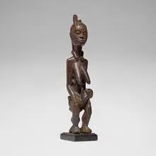 Yoruba, Maternity figure, carved wood