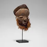 Pende, Mask, carved and painted wood, raffia, fiber cloth