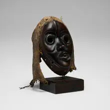 Dan, Mask, carved wood, fabric, feathers, rope