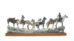 Successful by Earle Erik Heikka, polychromed bronze with wooden base, sold Aug 2010