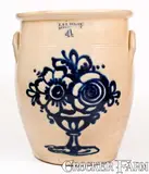 Exceptional Four-Gallon J. & E. NORTON / BENNINGTON, VT Stoneware Jar w/ Elaborate Flowering Urn by J. & E. Norton, circa 1855, Stoneware, sold Nov 2022