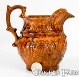 Rare JOHN BELL / WAYNESBORO Molded Redware Pitcher by John Bell, circa 1850-1880, Redware, sold Nov 2022