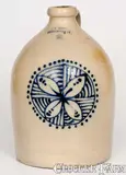 Exceptional J. & E. NORTON / BENNINGTON, VT Stoneware Jug w/ Cobalt Pinwheel Decoration by J. & E. Norton, circa 1855, Stoneware, sold Aug 2022