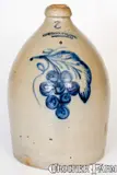 COWDEN & WILCOX / HARRISBURG, PA Stoneware Jug with Bold Grapes Decoration by Cowden & Wilcox, circa 1865, Stoneware, sold Aug 2021