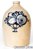 J. & E. NORTON / BENNINGTON, VT Stoneware Jug with Flowering Urn Decoration by J. & E. Norton, circa 1855, Stoneware, sold Aug 2020