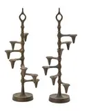 Jens Quistgaard, A pair of iron and brass candlesticks with adjustable candle holders