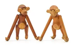 Kay Bojesen, Two patinated teak and limba wood monkeys, sculpture
