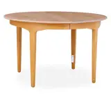 Henry Kjærnulf, Dining table of oak with extension and four extra leaves, hereof one with rail