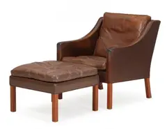 Børge Mogensen, Armchair and footstool with teak legs, seat, back, sides and loose cushions upholstered in patinated brown leather