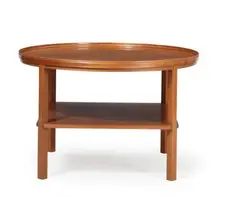 Kaare Klint, Circular mahogany coffee table with slightly raised edge and underlaying shelf