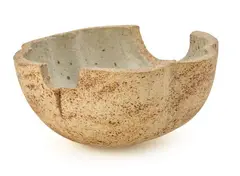 A sculptural stoneware bowl, the inside with incised “traces” and decorated with grey glaze by Gerd Hiort-Petersen, sold Sep 2026