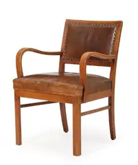 Danish cabinetmaker, Armchair with beech frame, upholstered in original leather fitted with brass nails