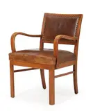 Danish cabinetmaker, Armchair with beech frame, upholstered in original leather fitted with brass nails