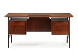 Gunni Omann, Freestanding rosewood desk with floating top, front with six drawers, reverse side with bookcases and compartment