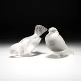 René Lalique (French, 1860-1945), Two 'Moineau' Paperweights by René Lalique, glass, moulded and frosted, stencilled R, sold Feb 2024