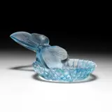 René Lalique (French, 1860-1945), A 'Dahlia Et Papillon' Cendrier, Designed 1931 by René Lalique, glass with blue staining, acid etched R, sold Jan 2024