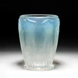 René Lalique (French, 1860-1945), A 'Danaïdes' Vase, Designed 1926 by René Lalique, glass, heightened with blue staining, wheel-cut R, sold Nov 2023