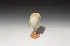 Headdress by Amalie Szeps, sold Dec 2025