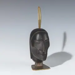 Head with feather by Franz Hagenauer, bronze patinated, brass; signed on the plinth with "WHW" in the circle, "MADE IN/VIENNA/AUSTRIA" and "Handmade", sold Dec 2025
