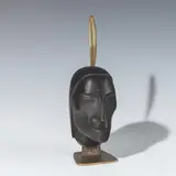 Franz Hagenauer, Head with feather, bronze patinated, brass; signed on the plinth with "WHW" in the circle, "MADE IN/VIENNA/AUSTRIA" and "Handmade"