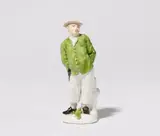 Peter Reinicke, A rare Meissen porcelain figure of a peasant in a green jacket