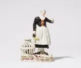 Johann Friedrich Lück, A Frankenthal porcelain figure of a farmer's wife with a basket of chickens