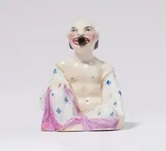 Meissen Royal Porcelain Manufactory, A Meissen porcelain crouching Buddha