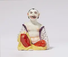 Meissen Royal Porcelain Manufactory, A Meissen porcelain crouching Buddha