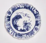 Meissen Royal Porcelain Manufactory, A Meissen blue and white porcelain plate with a phoenix amid prunus sprigs