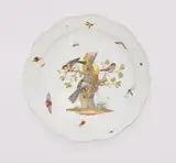 Meissen Royal Porcelain Manufactory, A Meissen porcelain dish with a yellow woodpecker and bullfinches