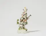 Carl Christoph Punct, A Meissen porcelain figure of a shepherd with a lute and a dog