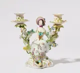 Meissen Royal Porcelain Manufactory, A Meissen porcelain candlestick with a gardener figure