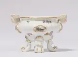 A Meissen porcelain salt with sculpted female heads by Meissen Royal Porcelain Manufactory, sold May 2026
