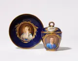 A Meissen porcelain lidded cup and saucer with portraits of a couple as Lotte and Werther by Meissen Royal Porcelain Manufactory, sold May 2026
