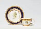 A KPM Berlin porcelain cup and saucer from a tea service with Classical busts by Königliche Porzellanmanufaktur Berlin Kpm, sold Apr 2026