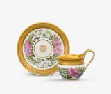 Königliche Porzellanmanufaktur Berlin Kpm, A KPM Berlin porcelain cup and saucer with acacia flower wreaths