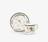 A KPM Berlin porcelain cup and saucer with scattered feathers by Königliche Porzellanmanufaktur Berlin Kpm, sold Apr 2026